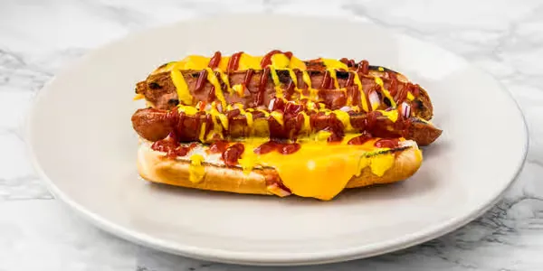 Cheese dog with mustard and ketchup at Yallah Eat on Pembina Hwy, Winnipeg