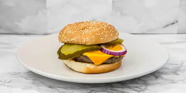 Cheeseburger with pickles and onion at Yallah Eat on Pembina Hwy, Winnipeg
