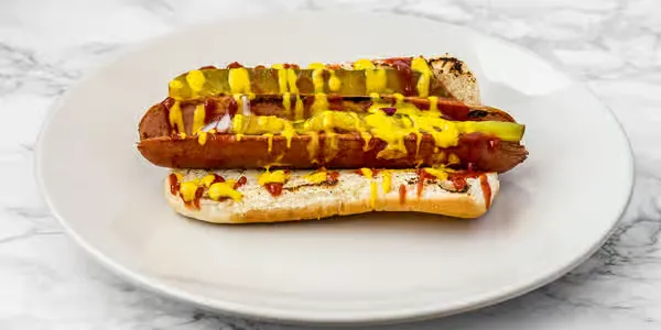 Hot dog with mustard and ketchup at Yallah Eat on Pembina Hwy, Winnipeg