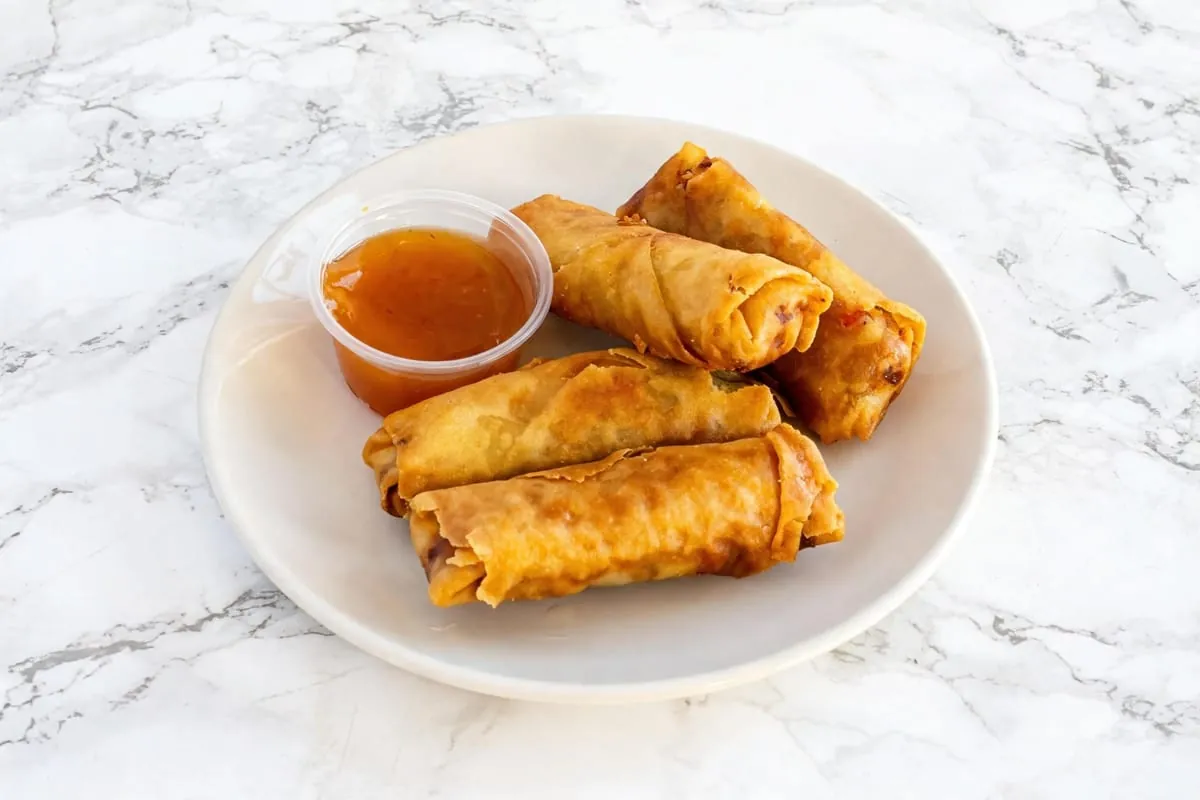 Four spring rolls with dipping sauce at Yallah Eat on Pembina Hwy, Winnipeg