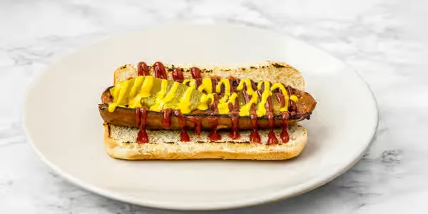 Veggie hot dog with mustard and ketchup at Yallah Eat on Pembina Hwy, Winnipeg